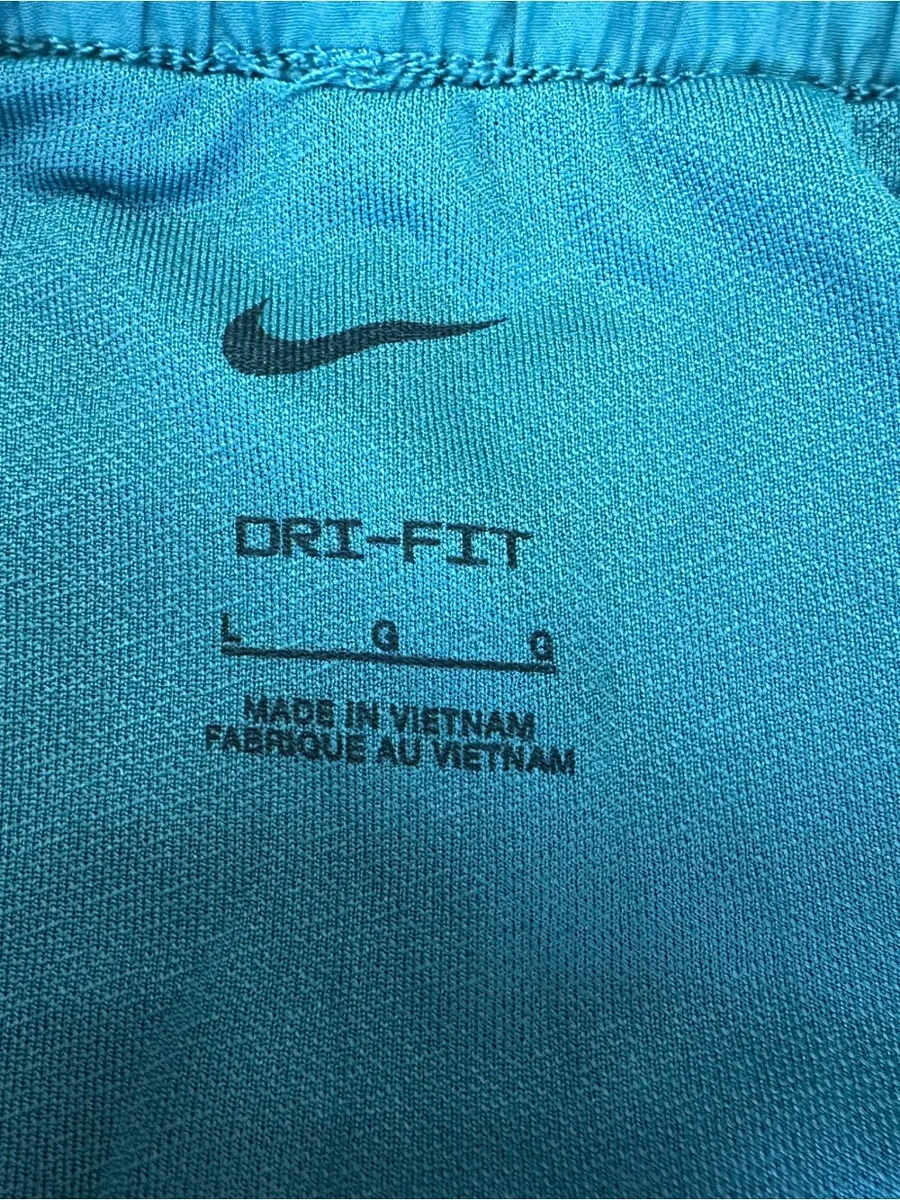 Nike Girl’s Dark Teal Running Shorts with Nike Swoosh